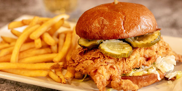 Fried chicken sandwich with pickles from Wayzata Bar and Grill