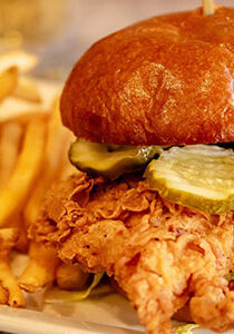 Fried chicken sandwich with pickles from Wayzata Bar and Grill